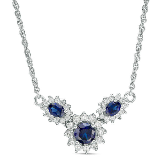 Oval and Round Lab-Created Blue and White Sapphire Sunburst Frame Three Stone Necklace in Sterling Silver