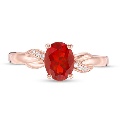 Oval Fire Opal and Natural Diamond Accent Infinity Knot Ring in Solid 10K Rose Gold
