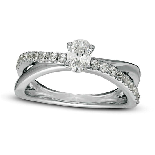 0.75 CT. T.W. Oval Natural Diamond Crossover Engagement Ring in Solid 14K White Gold