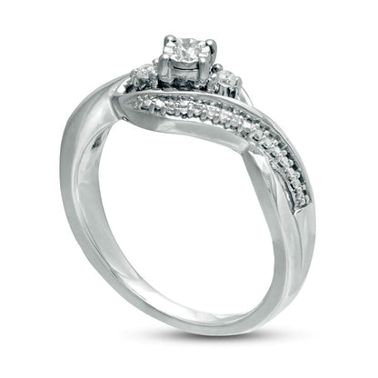 0.10 CT. T.W. Natural Diamond Three Stone Twist Shank Promise Ring in Sterling Silver