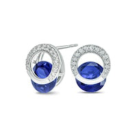 Lab-Created Blue Sapphire and 0.2 CT. T.W. Diamond Milgrain Open Circle Clip-Style Stud Earrings in Sterling Silver