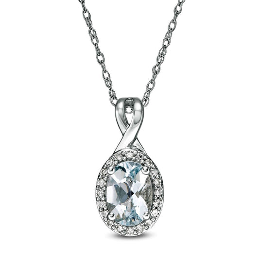Oval Aquamarine and 0.07 CT. T.W. Natural Diamond Frame Pendant in 10K White Gold