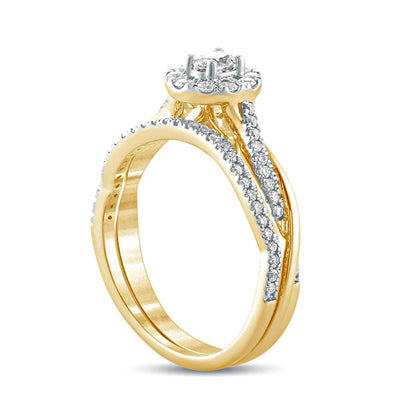 0.50 CT. T.W. Oval Natural Diamond Frame Twist Shank Bridal Engagement Ring Set in Solid 10K Yellow Gold