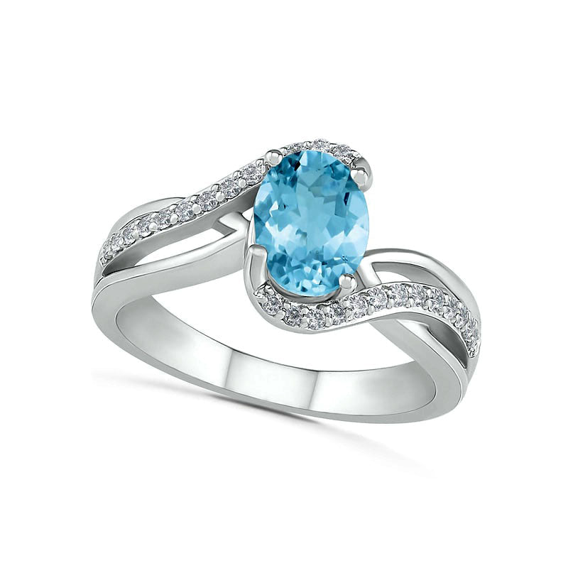Oval Aquamarine and 0.10 CT. T.W. Natural Diamond Bypass Split Shank Bridal Engagement Ring Set in Sterling Silver