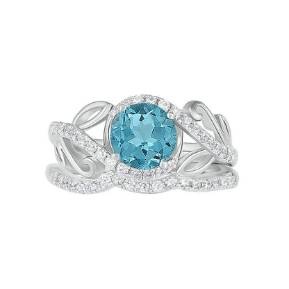 7.0mm Aquamarine and 0.38 CT. T.W. Natural Diamond Bypass Leaf Shank Bridal Engagement Ring Set in Solid 10K White Gold