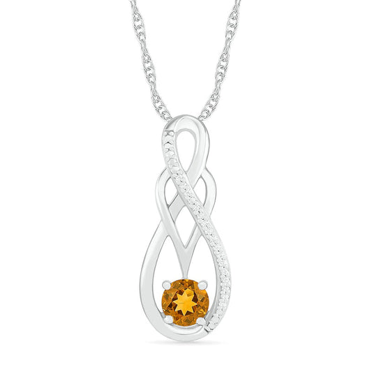 Citrine and 0.05 CT. T.W. Natural Diamond Overlay Infinity Pendant in Sterling Silver