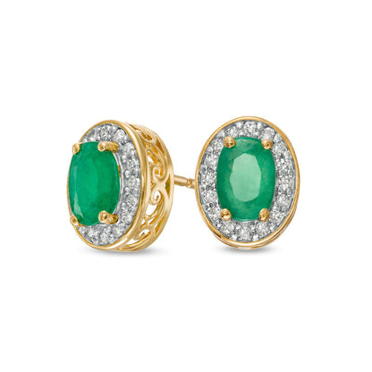 Oval Emerald and 0.13 CT. T.W. Diamond Frame Ornate Stud Earrings in 10K Gold