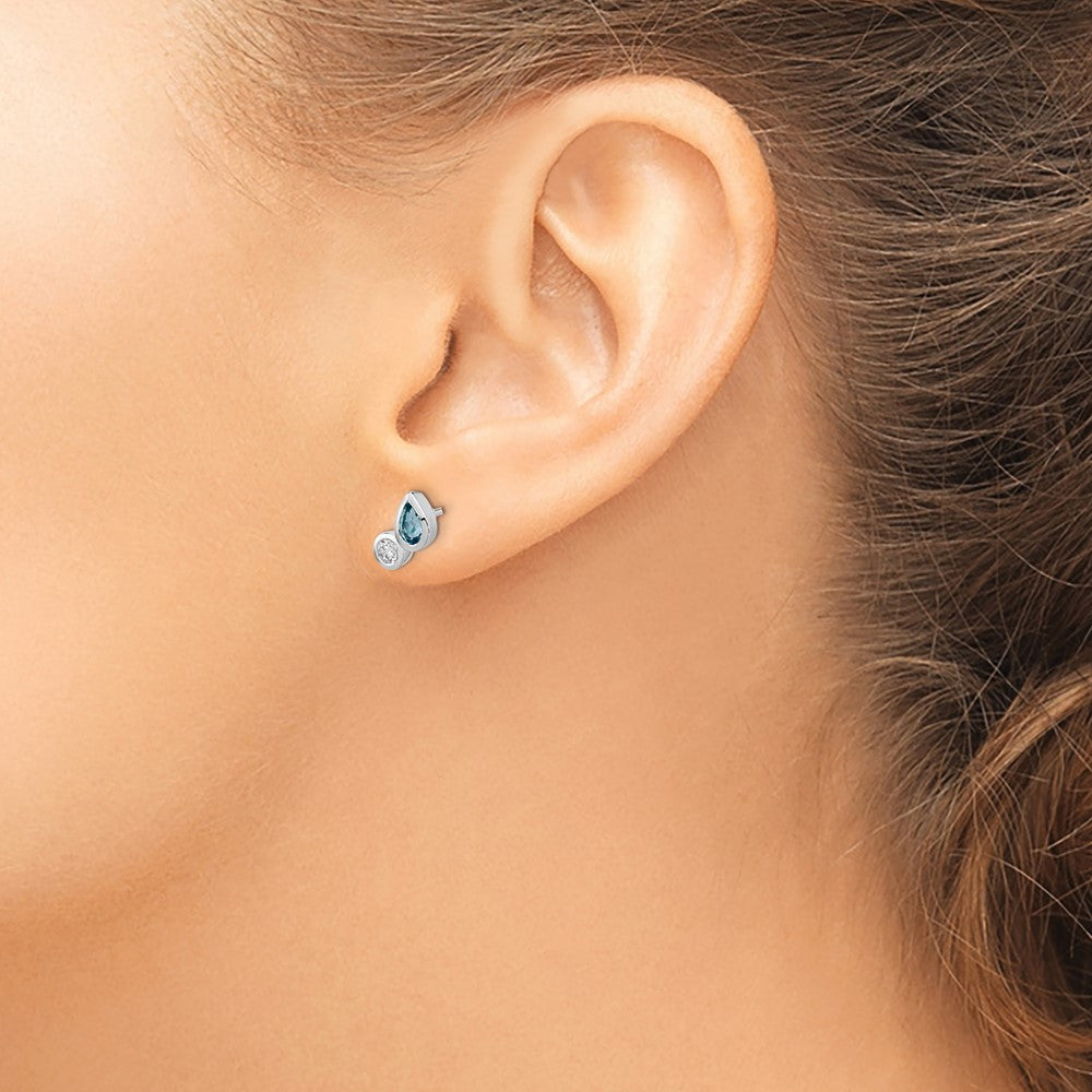 Sterling Silver Rhodium Sky Blue Topaz and CZ Post Earrings