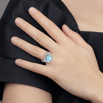 Sterling Silver Rhodium Checker-Cut Sky Blue Topaz Ring