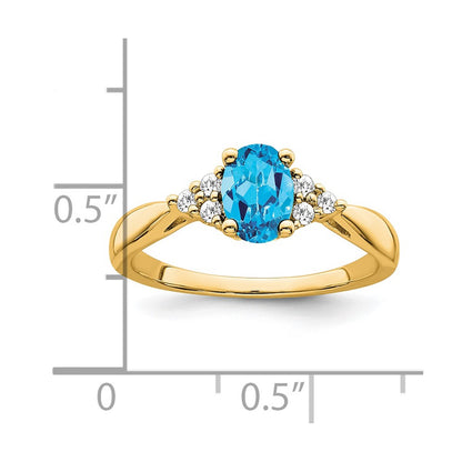 Solid 14k Yellow Gold Simulated Blue Topaz and CZ Ring