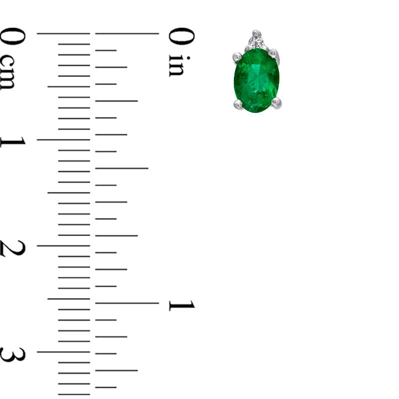 Oval Emerald and Diamond Accent Stud Earrings in 14K White Gold