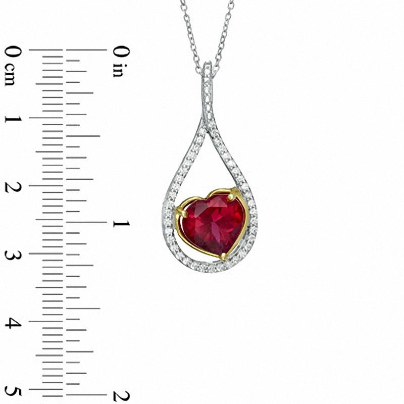 Heart-Shaped Lab-Created Ruby and 0.25 CT. T.W. Diamond Pendant in Sterling Silver