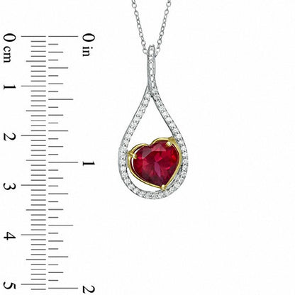 Heart-Shaped Lab-Created Ruby and 0.25 CT. T.W. Diamond Pendant in Sterling Silver