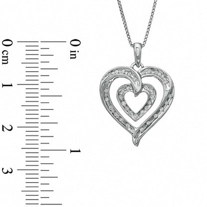 0.13 CT. T.W. Natural Diamond Double Row Heart Pendant in Sterling Silver