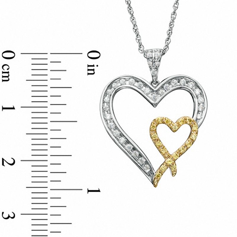 0.25 CT. T.W. Enhanced Yellow and White Natural Diamond Double Heart Pendant in Sterling Silver