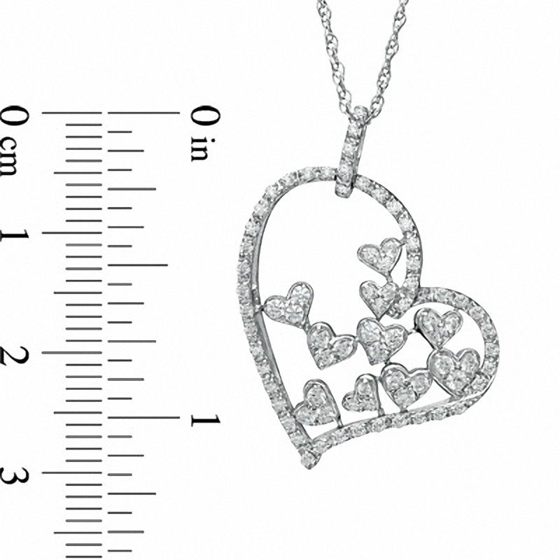 0.5 CT. T.W. Natural Diamond Fluttering Heart Pendant in Sterling Silver