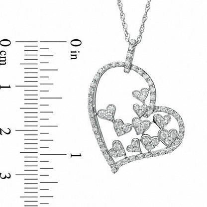 0.5 CT. T.W. Natural Diamond Fluttering Heart Pendant in Sterling Silver