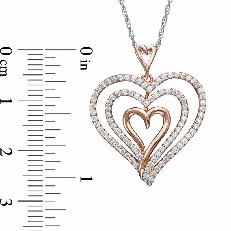 0.25 CT. T.W. Natural Diamond Layered Heart Pendant in Sterling Silver with Rose Rhodium