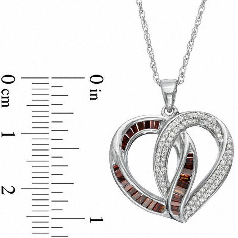 0.75 CT. T.W. Enhanced Red Baguette and White Natural Diamond Heart Pendant in Sterling Silver