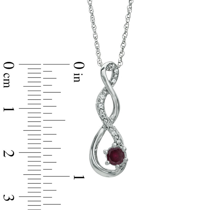 5.5mm Garnet and Natural Diamond Accent Twist Pendant in Sterling Silver