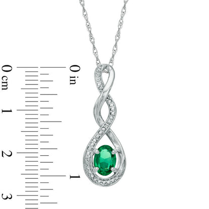 Oval Lab-Created Emerald and Diamond Accent Infinity Twist Pendant in Sterling Silver
