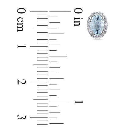 Oval Aquamarine and Diamond Accent Frame Stud Earrings in 10K White Gold