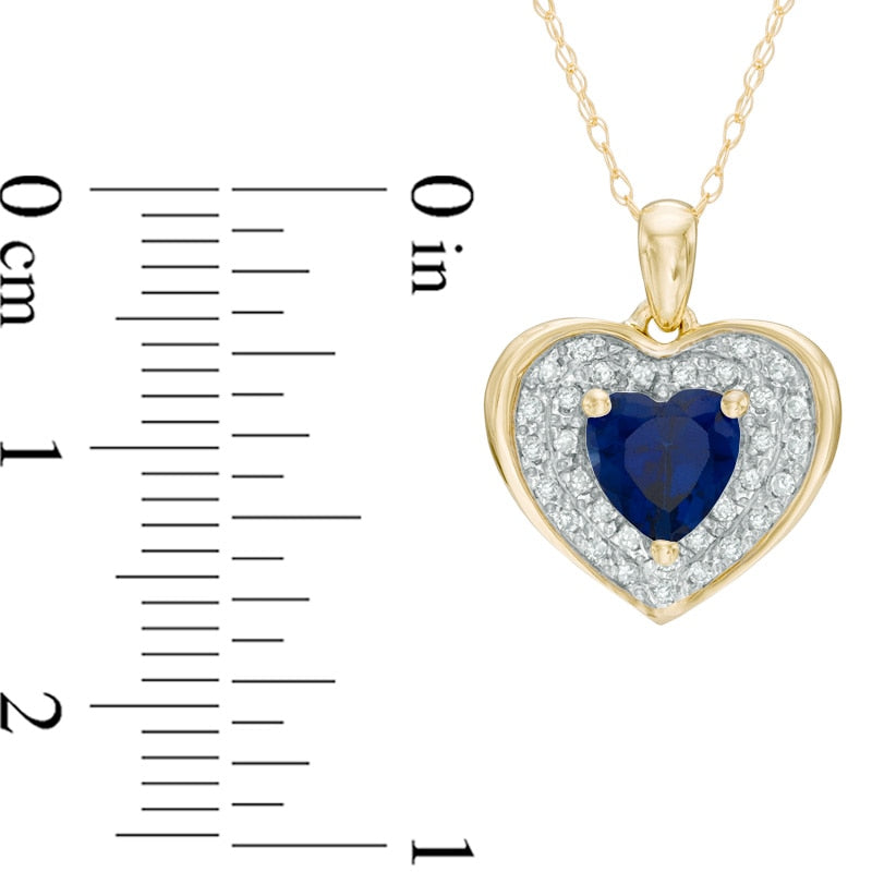 6.0mm Heart-Shaped Lab-Created Blue Sapphire and 0.13 CT. T.W. Diamond Frame Heart Pendant in 10K Yellow Gold