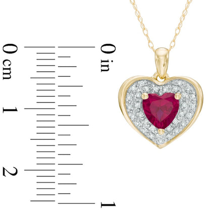 6.0mm Heart-Shaped Lab-Created Ruby and 0.13 CT. T.W. Diamond Frame Heart Pendant in 10K Yellow Gold