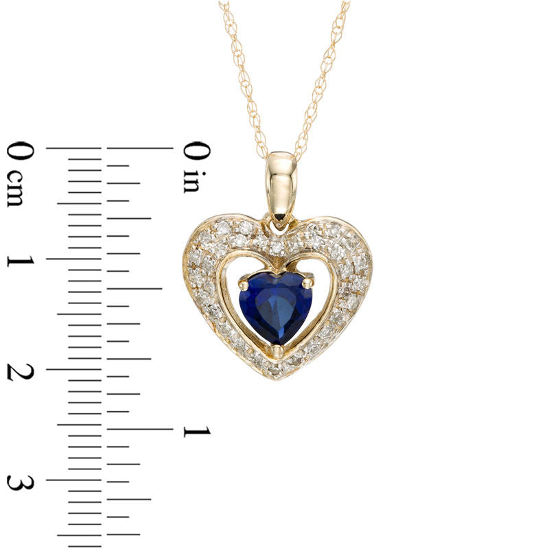5.0mm Heart-Shaped Lab-Created Blue Sapphire and 0.13 CT. T.W. Diamond Frame Heart Pendant in 10K Yellow Gold