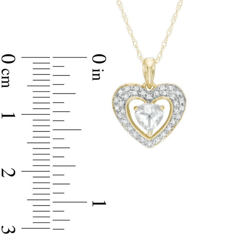 5.0mm Heart-Shaped Aquamarine and 0.13 CT. T.W. Natural Diamond Frame Heart Pendant in 10K Yellow Gold