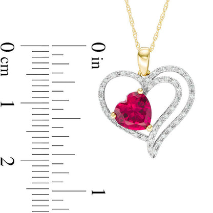 7.0mm Lab-Created Ruby and 0.17 CT. T.W. Diamond Multi-Row Heart Pendant in 10K Yellow Gold