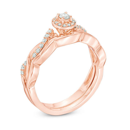 1/4 CT. T.W. Diamond Frame Twist Bridal Engagement Ring Set in 14K Rose Gold
