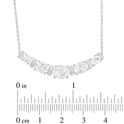 Oval Lab-Created White Sapphire and 0.1 CT. T.W. Diamond Graduated Five Stone Necklace in Sterling Silver