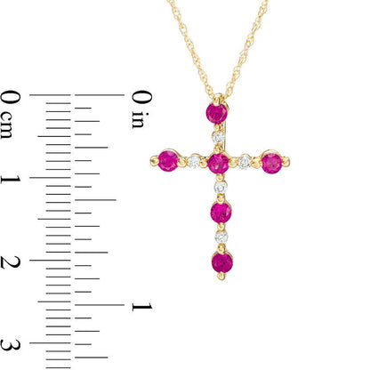 Lab-Created Ruby and Diamond Accent Cross Pendant in 10K Yellow Gold