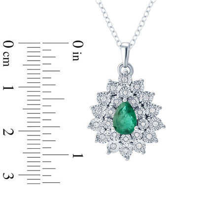 Pear-Shaped Lab-Created Emerald and 0.1 CT. T.W. Diamond Starburst Frame Pendant in Sterling Silver