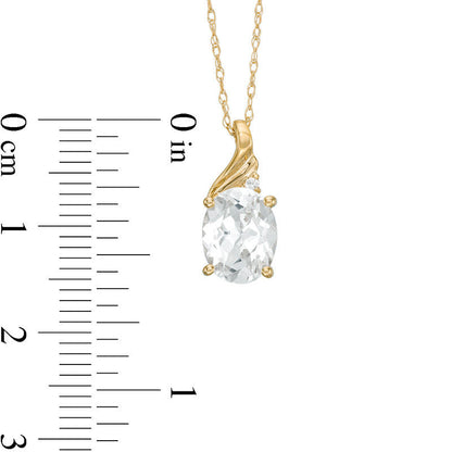 Oval Lab-Created White Sapphire and Diamond Accent Swirl Top Pendant in 10K Yellow Gold