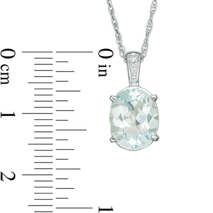 Oval Blue Topaz and Natural Diamond Accent Bale Drop Pendant in Sterling Silver