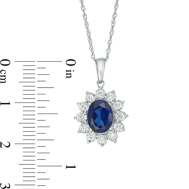 Oval Lab-Created Blue Sapphire and 0.25 CT. T.W. Diamond Starburst Frame Pendant in 10K White Gold