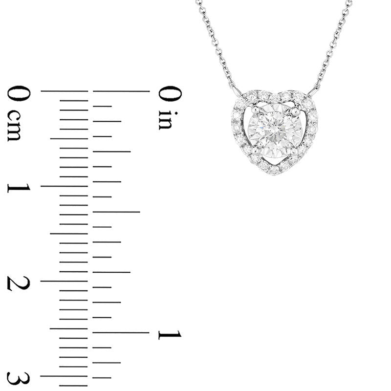 0.33 CT. T.W. Natural Diamond Heart Frame Pendant in 10K White Gold