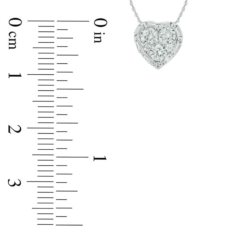 0.63 CT. T.W. Baguette and Round Natural Diamond Heart Frame Pendant in 10K White Gold