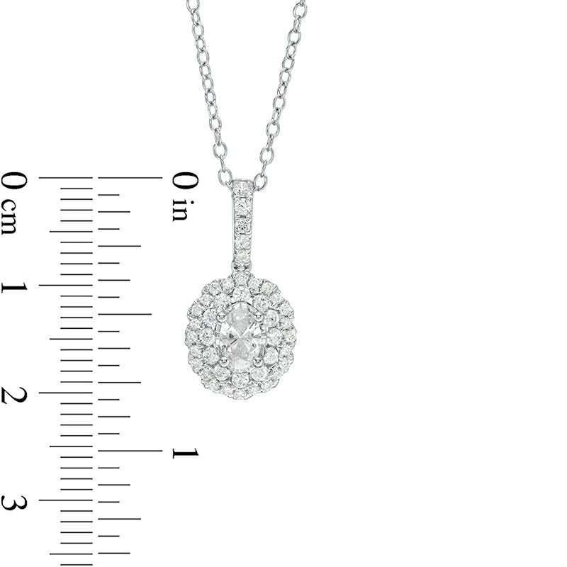 0.75 CT. T.W. Certified Oval Natural Diamond Scallop Frame Pendant in 14K White Gold (I/I1)