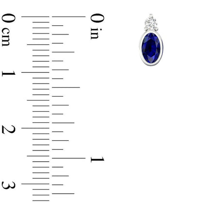 Blue and White Sapphire Stud Earrings in 10K White Gold