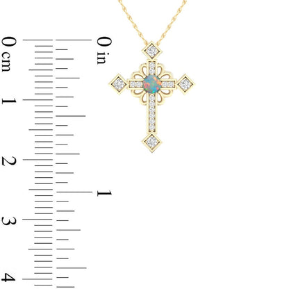 Lab-Created Opal and 0.05 CT. T.W. Diamond Gothic-Style Cross Pendant in 10K Yellow Gold