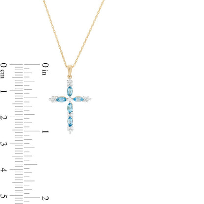 Marquise Swiss Blue Topaz and 0.07 CT. T.W. Natural Diamond Cross Pendant in 10K Yellow Gold