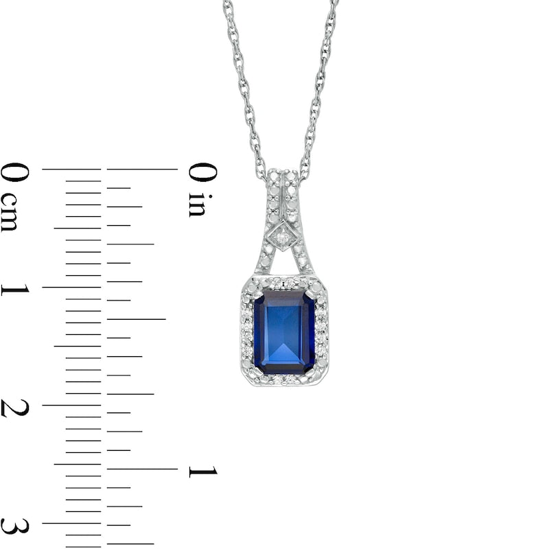 Emerald-Cut Lab-Created Blue Sapphire and 0.05 CT. T.W. Diamond Frame Drop Pendant in Sterling Silver
