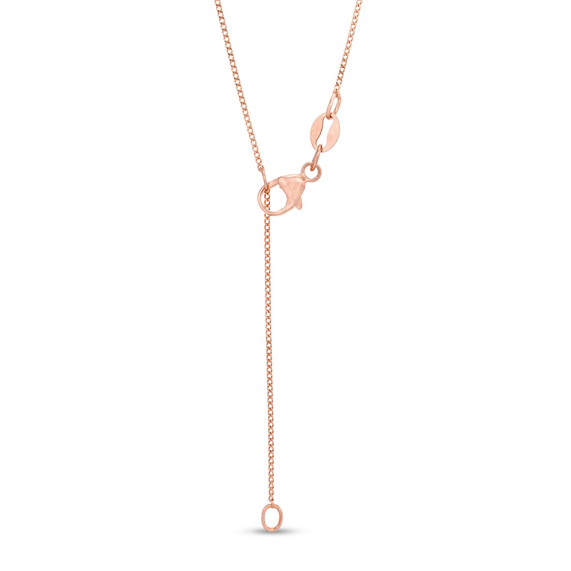 0.25 CT. T.W. Baguette and Round Natural Diamond Vertical Bar Pendant in 10K Rose Gold