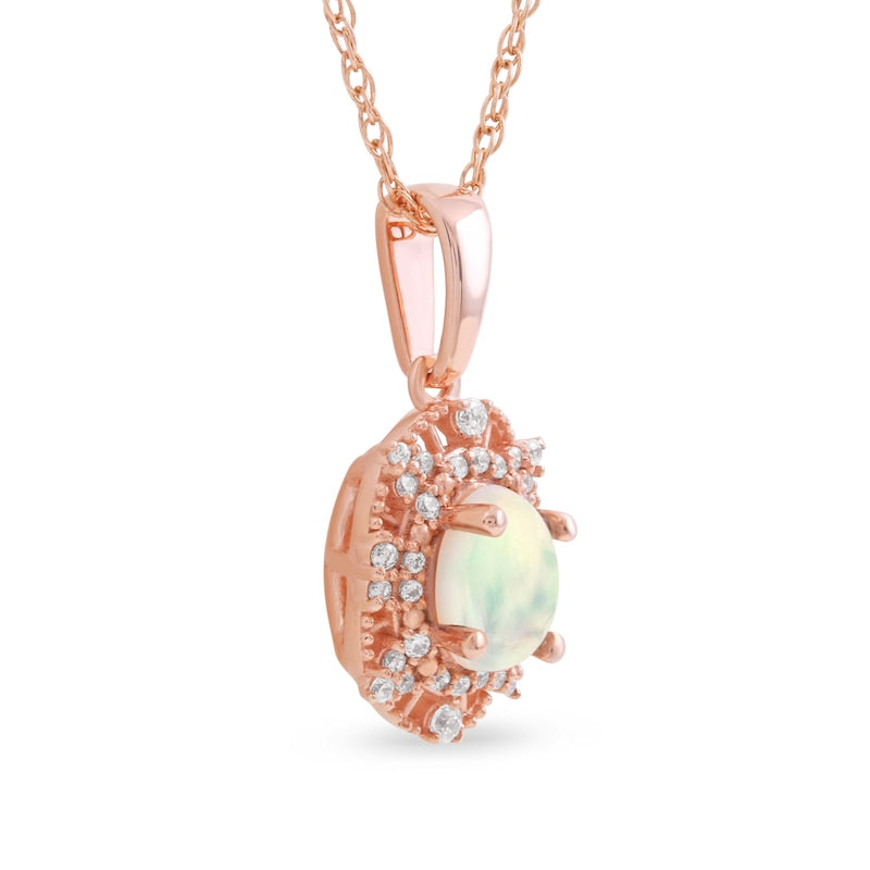 Oval Opal and 0.1 CT. T.W. Natural Diamond Bead Frame Sunburst Pendant in 10K Rose Gold