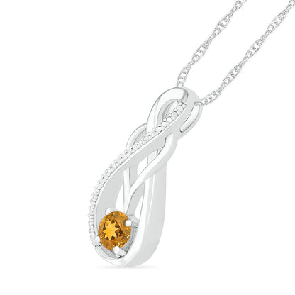 Citrine and 0.05 CT. T.W. Natural Diamond Overlay Infinity Pendant in Sterling Silver