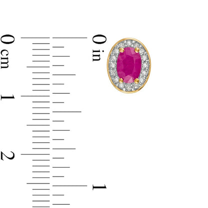 Oval Ruby and 0.13 CT. T.W. Diamond Frame Ornate Stud Earrings in 10K Gold