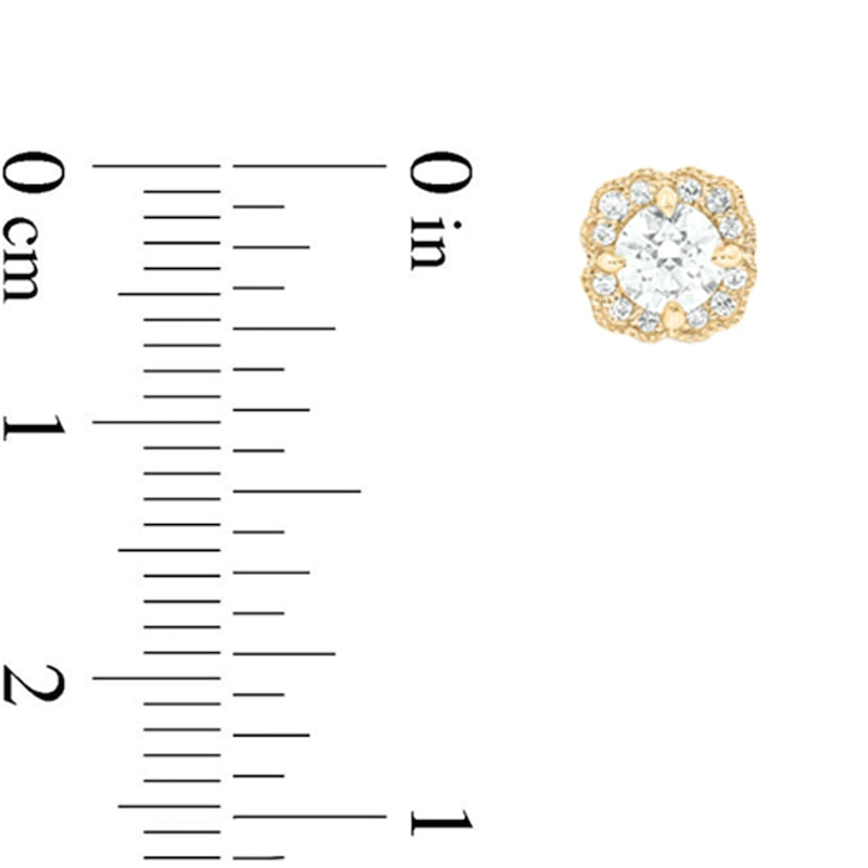 0.5 CT. T.W. Diamond Flower Frame Vintage-Style Stud Earrings in 10K Gold (I/I2)